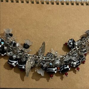 Handmade Extra Chunky Black and Silver Angel Wings Charm Bracelet Lampwork Beads